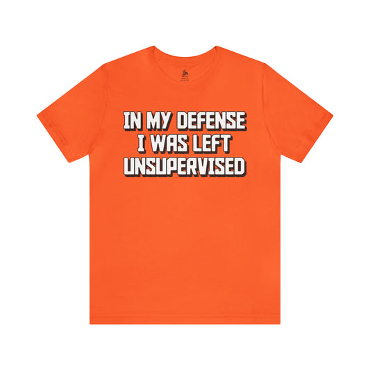 In My Defense I Was Left Unsupervised Unisex Short Sleeve Softstyle T-Shirt